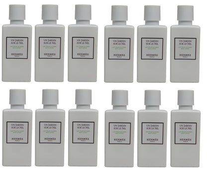 Hermes Un Jardin Sur le Nil Lotion lot of 12ea 1.35oz Bottles. Total of 16.2oz